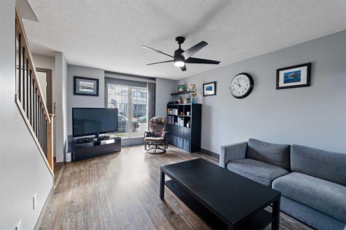 11 Woodside Circle, Airdrie, AB - Indoor Photo Showing Living Room