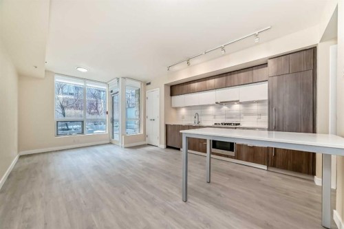110-51 Waterfront Mews Sw, Calgary, AB - Indoor Photo Showing Kitchen