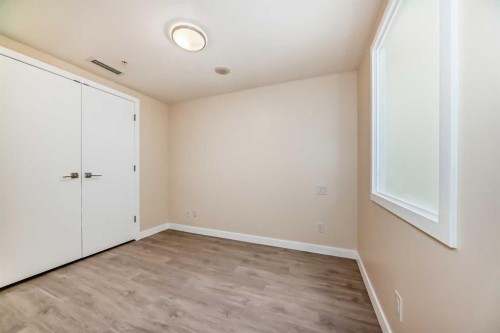 110-51 Waterfront Mews Sw, Calgary, AB - Indoor Photo Showing Other Room