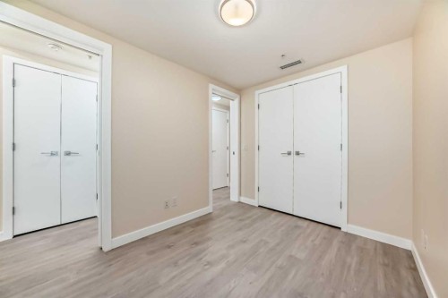 110-51 Waterfront Mews Sw, Calgary, AB - Indoor Photo Showing Other Room