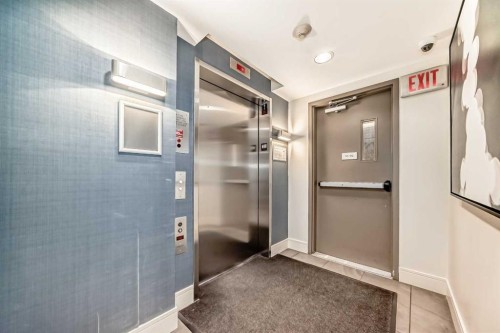 110-51 Waterfront Mews Sw, Calgary, AB - Indoor Photo Showing Other Room