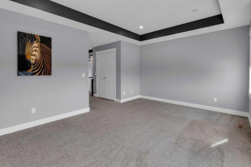 1112 Iron Landing Way, Crossfield, AB - Indoor Photo Showing Other Room