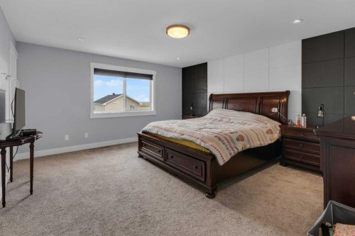 1112 Iron Landing Way, Crossfield, AB - Indoor Photo Showing Bedroom