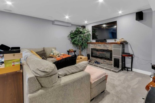 1112 Iron Landing Way, Crossfield, AB - Indoor With Fireplace