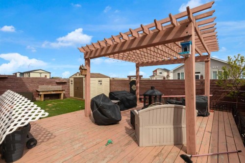 1112 Iron Landing Way, Crossfield, AB - Outdoor With Deck Patio Veranda