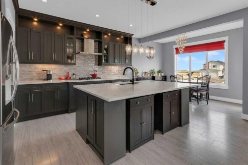 1112 Iron Landing Way, Crossfield, AB - Indoor Photo Showing Kitchen With Upgraded Kitchen