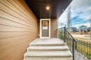 151 Sundown Way, Cochrane, AB  - Outdoor With Exterior 