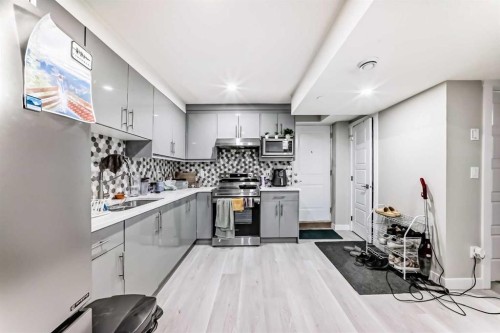 172 Redstone Park Ne, Calgary, AB - Indoor Photo Showing Kitchen With Double Sink
