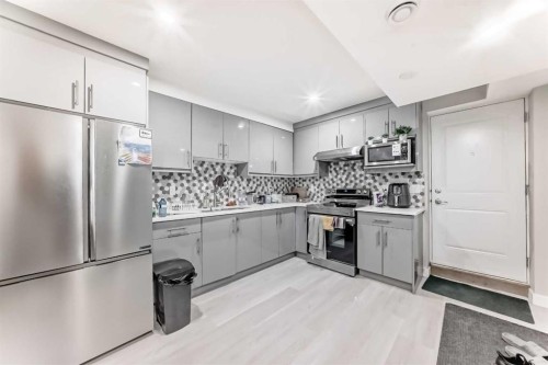 172 Redstone Park Ne, Calgary, AB - Indoor Photo Showing Kitchen With Stainless Steel Kitchen With Double Sink With Upgraded Kitchen