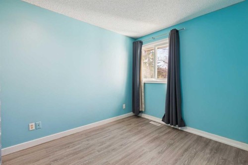 1002-2520 Palliser Drive Sw, Calgary, AB - Indoor Photo Showing Other Room