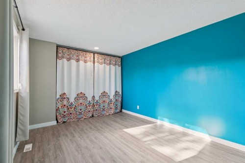 1002-2520 Palliser Drive Sw, Calgary, AB - Indoor Photo Showing Other Room
