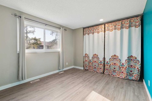 1002-2520 Palliser Drive Sw, Calgary, AB - Indoor Photo Showing Other Room
