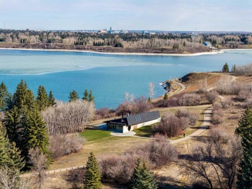 1002-2520 Palliser Drive Sw, Calgary, AB - Outdoor With Body Of Water With View