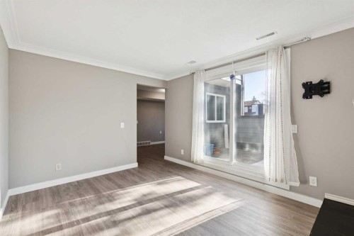 1002-2520 Palliser Drive Sw, Calgary, AB - Indoor Photo Showing Other Room
