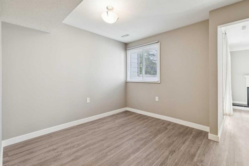 1002-2520 Palliser Drive Sw, Calgary, AB - Indoor Photo Showing Other Room