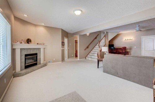 180 Sierra Morena Landing Sw, Calgary, AB - Indoor With Fireplace