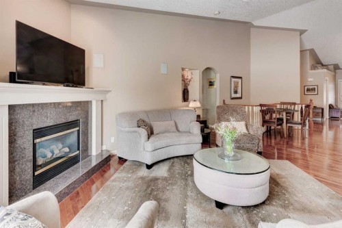 180 Sierra Morena Landing Sw, Calgary, AB - Indoor Photo Showing Living Room With Fireplace