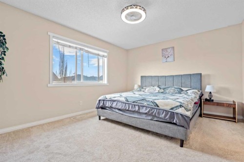 332 Oakmere Way, Chestermere, AB - Indoor Photo Showing Bedroom