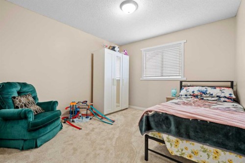 332 Oakmere Way, Chestermere, AB - Indoor Photo Showing Bedroom