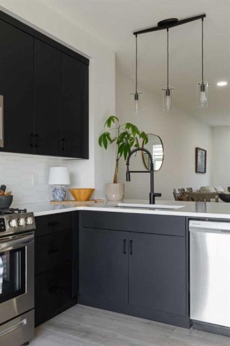 74 Spring Willow Close Sw, Calgary, AB - Indoor Photo Showing Kitchen With Upgraded Kitchen