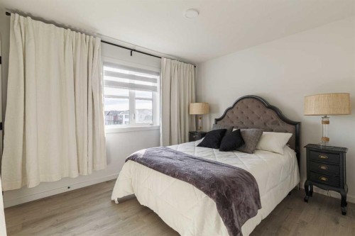 74 Spring Willow Close Sw, Calgary, AB - Indoor Photo Showing Bedroom