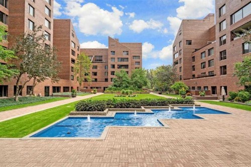 1002A-500 Eau Claire Avenue Sw, Calgary, AB - Outdoor With In Ground Pool
