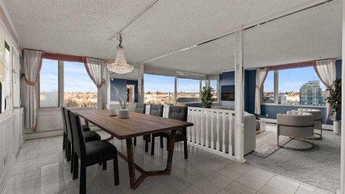 1002A-500 Eau Claire Avenue Sw, Calgary, AB - Indoor Photo Showing Dining Room