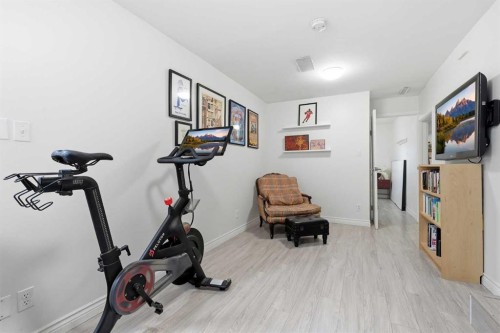 402 8A Street Ne, Calgary, AB - Indoor Photo Showing Gym Room
