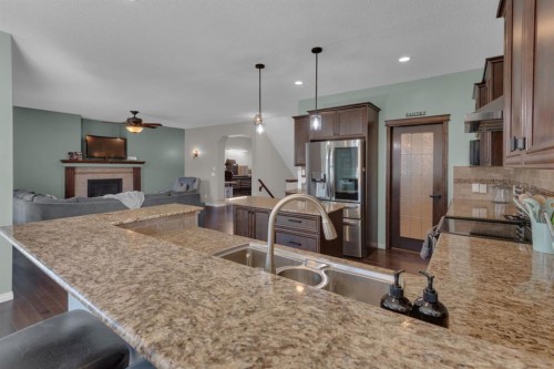 69 Morningside Circle Sw, Airdrie, AB - Indoor Photo Showing Kitchen With Upgraded Kitchen