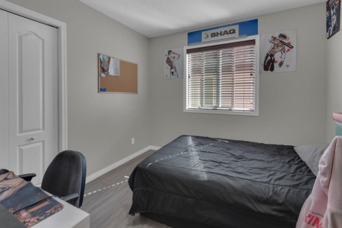 69 Morningside Circle Sw, Airdrie, AB - Indoor Photo Showing Bedroom