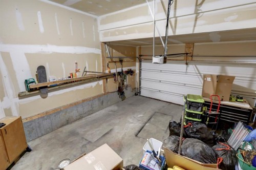 69 Morningside Circle Sw, Airdrie, AB - Indoor Photo Showing Garage