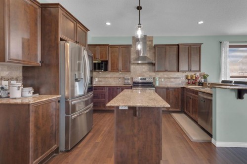 69 Morningside Circle Sw, Airdrie, AB - Indoor Photo Showing Kitchen With Upgraded Kitchen