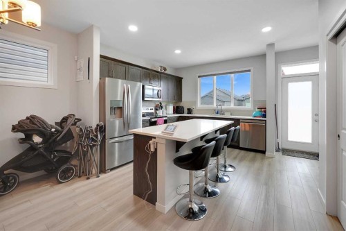 32 Seton Row Se, Calgary, AB - Indoor Photo Showing Kitchen With Upgraded Kitchen