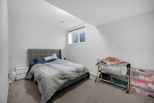 32 Seton Row Se, Calgary, AB - Indoor Photo Showing Bedroom