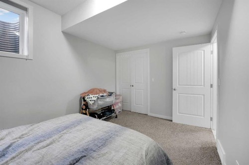 32 Seton Row Se, Calgary, AB - Indoor Photo Showing Bedroom