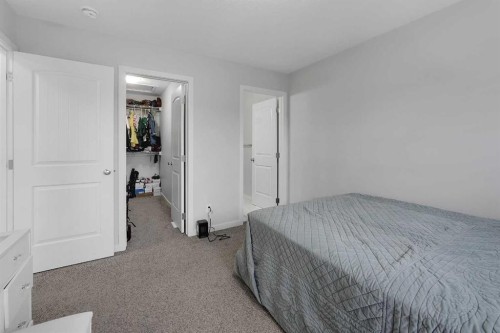 32 Seton Row Se, Calgary, AB - Indoor Photo Showing Bedroom