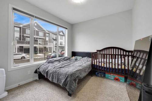 32 Seton Row Se, Calgary, AB - Indoor Photo Showing Bedroom