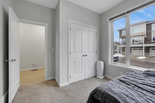 32 Seton Row Se, Calgary, AB - Indoor Photo Showing Bedroom