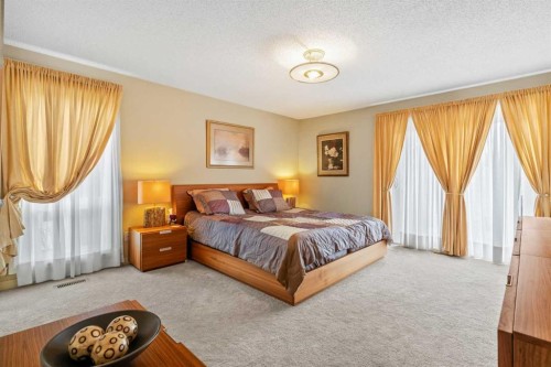 91 Sun Valley Drive Se, Calgary, AB - Indoor Photo Showing Bedroom