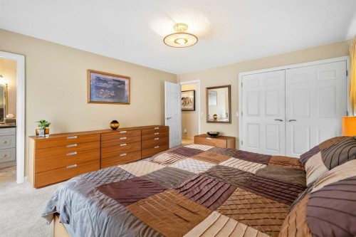 91 Sun Valley Drive Se, Calgary, AB - Indoor Photo Showing Bedroom