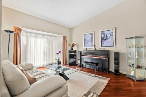 91 Sun Valley Drive Se, Calgary, AB - Indoor Photo Showing Living Room With Fireplace