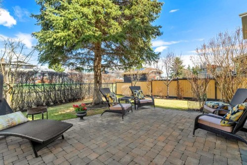 91 Sun Valley Drive Se, Calgary, AB - Outdoor With Deck Patio Veranda With Backyard