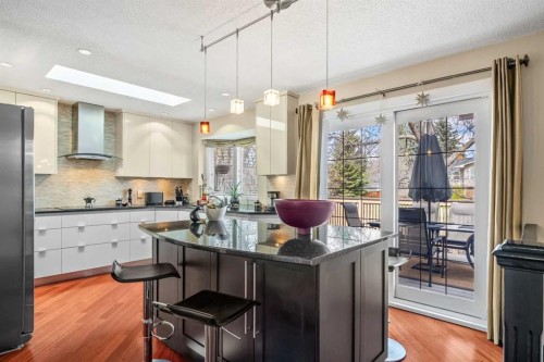 91 Sun Valley Drive Se, Calgary, AB - Indoor Photo Showing Kitchen With Upgraded Kitchen