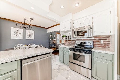 51 Foxwell Road Se, Calgary, AB - Indoor Photo Showing Kitchen With Stainless Steel Kitchen