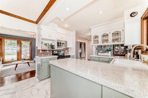 51 Foxwell Road Se, Calgary, AB - Indoor Photo Showing Kitchen With Double Sink With Upgraded Kitchen