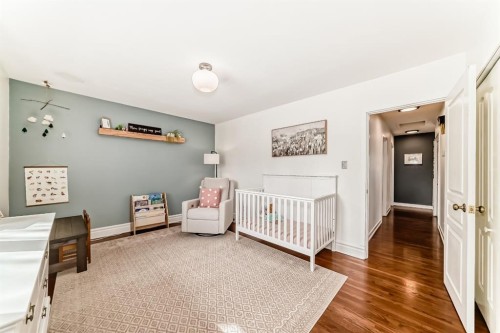 51 Foxwell Road Se, Calgary, AB - Indoor Photo Showing Bedroom