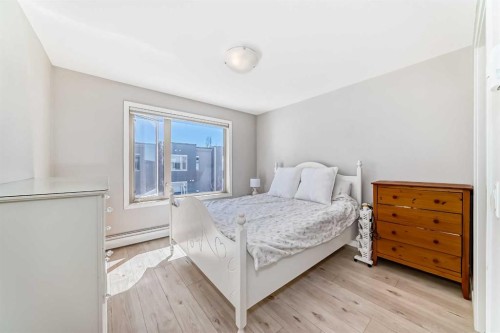 220-7 Westpark Common Sw, Calgary, AB - Indoor Photo Showing Bedroom