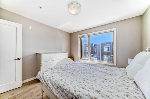 220-7 Westpark Common Sw, Calgary, AB - Indoor Photo Showing Bedroom