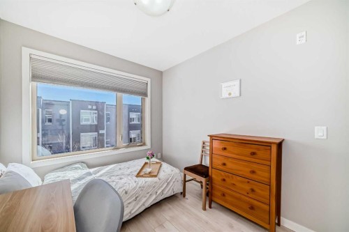 220-7 Westpark Common Sw, Calgary, AB - Indoor Photo Showing Bedroom