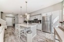 220-7 Westpark Common Sw, Calgary, AB  - Indoor Photo Showing Kitchen With Stainless Steel Kitchen With Upgraded Kitchen 
